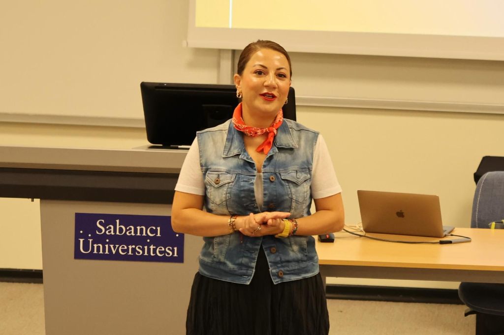 Ilkem Kayican Dipcin presenting at Sabancı University — mastering the art of being in the room